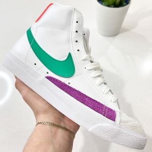 white blazers with green swoosh